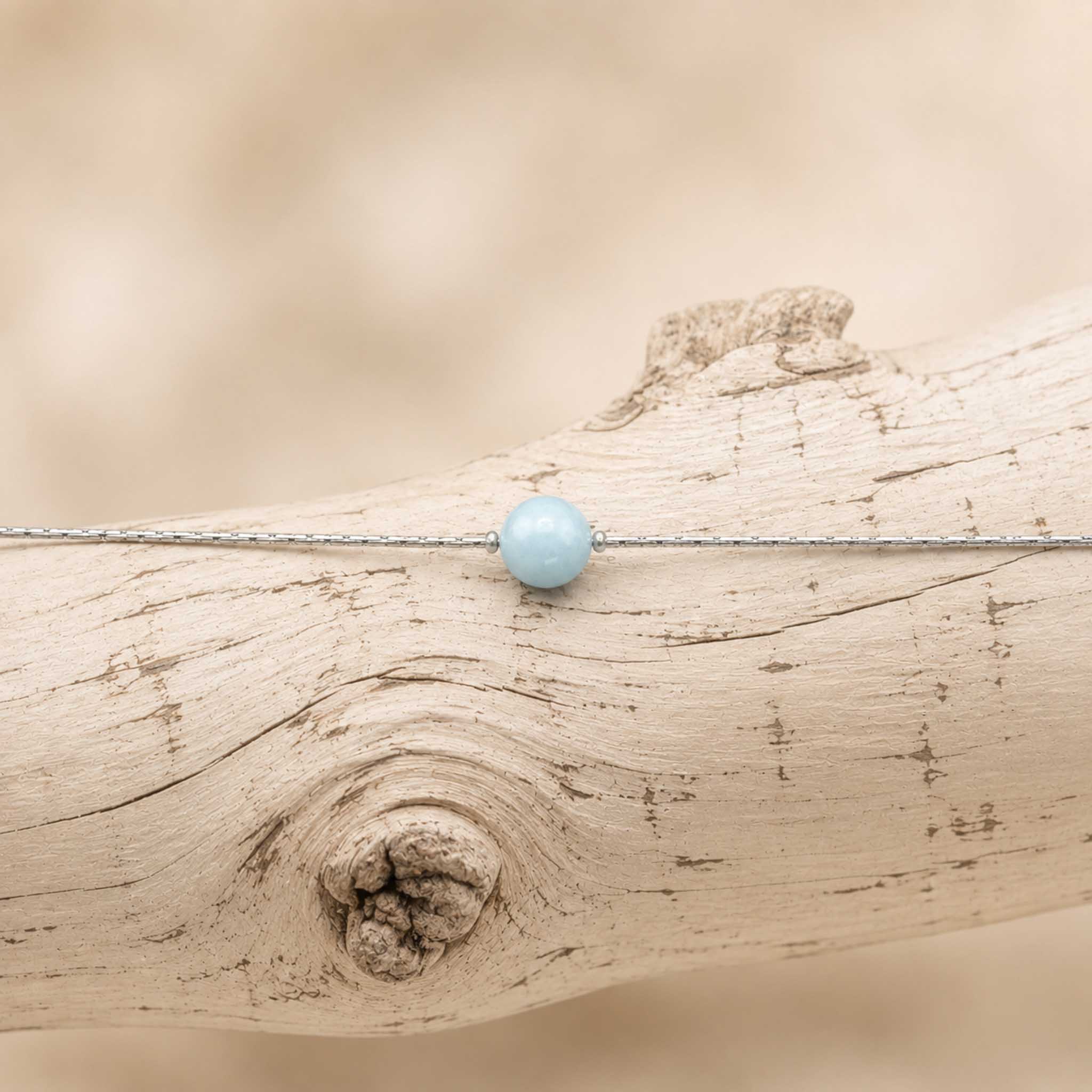 Collana con sfera in pietra naturale