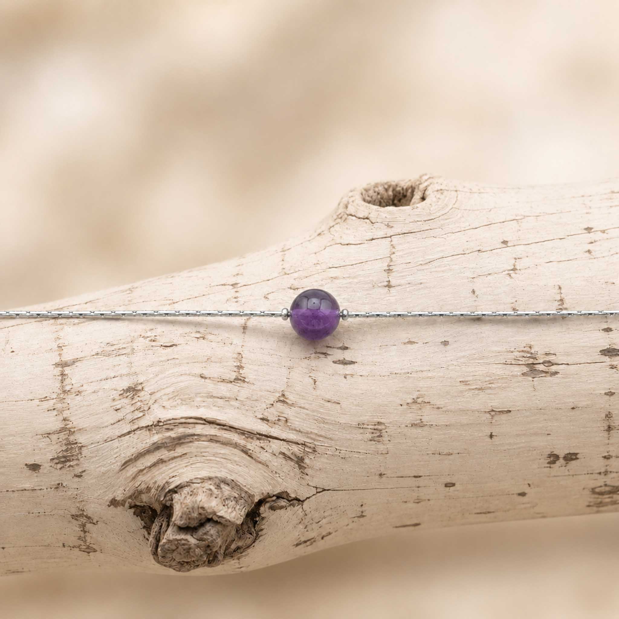 Collana con sfera in pietra naturale