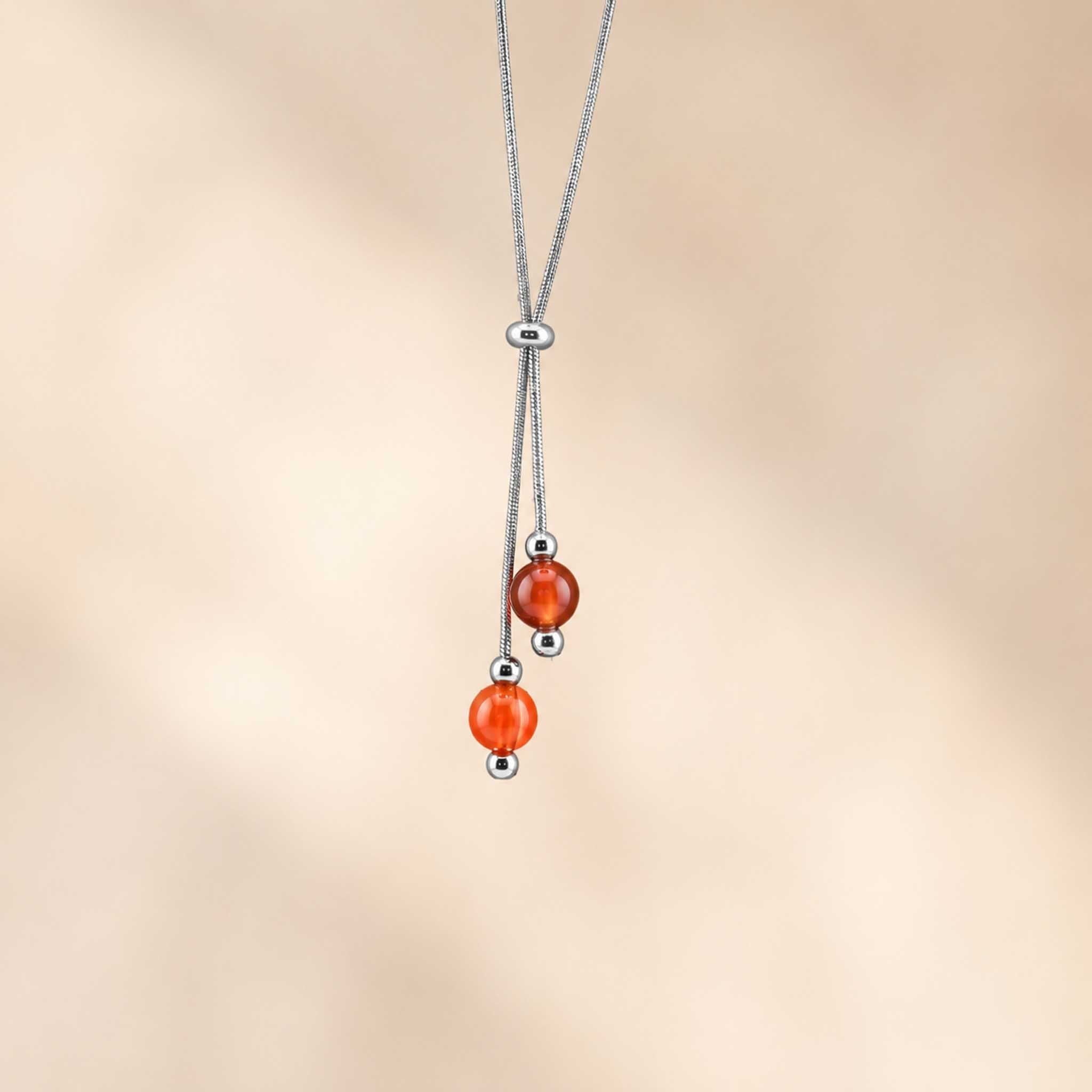 Collana con doppia sfera in pietra naturale