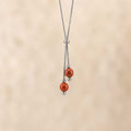 Collana con doppia sfera in pietra naturale