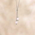 Collana con doppia sfera in pietra naturale