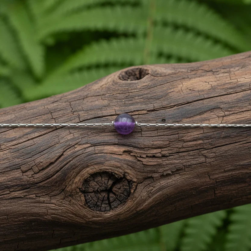 Collana singola sfera e orecchini a lobo con pietre naturali