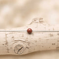 Collana con sfera in pietra naturale