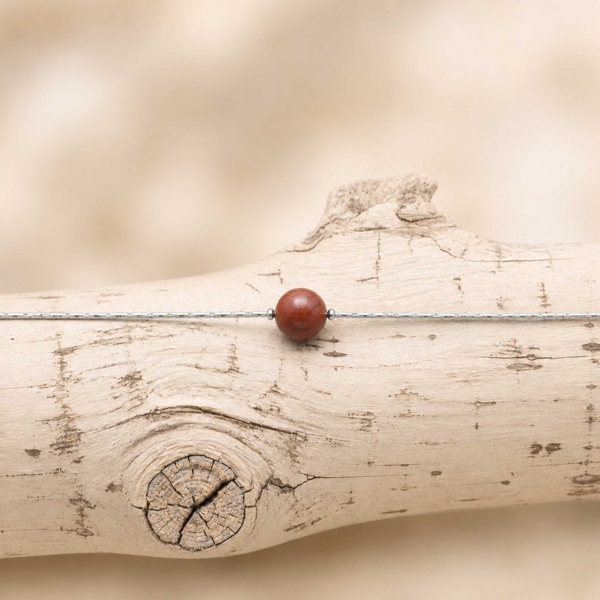 Collana con sfera in pietra naturale