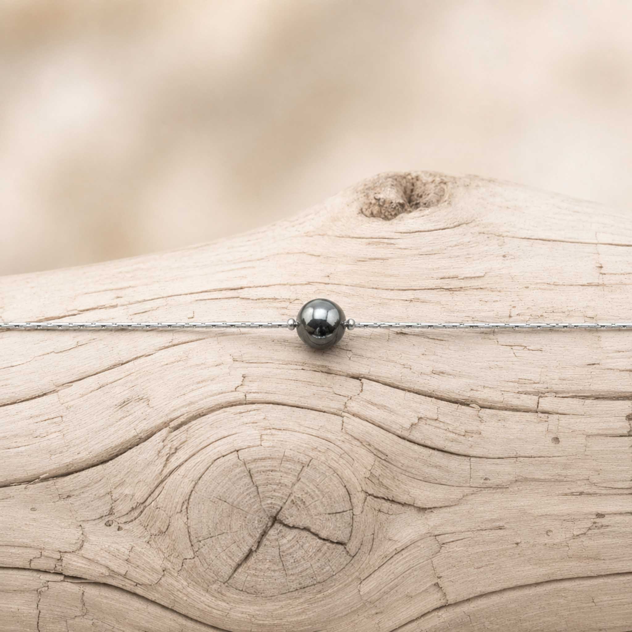 Collana con sfera in pietra naturale
