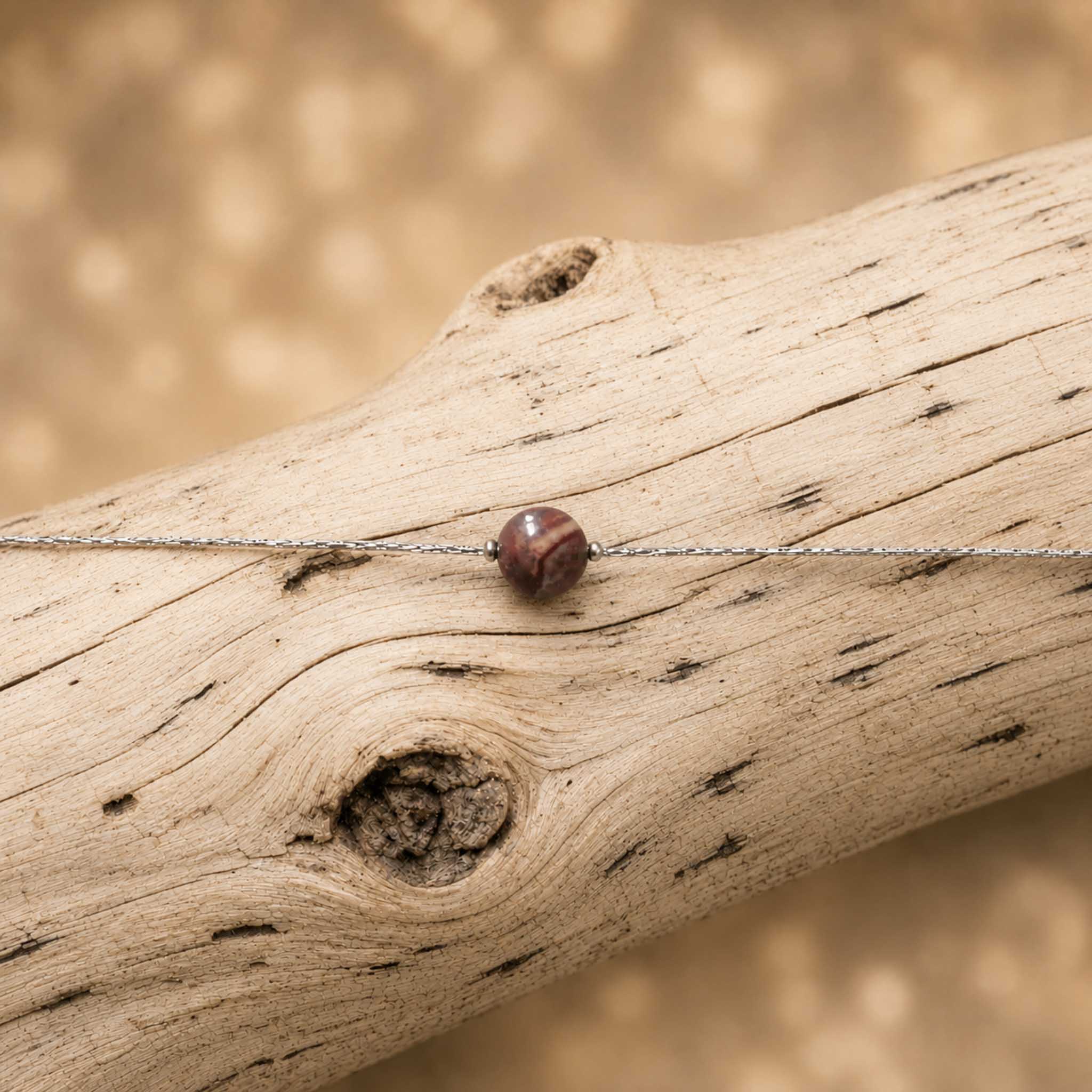 Collana con sfera in pietra naturale
