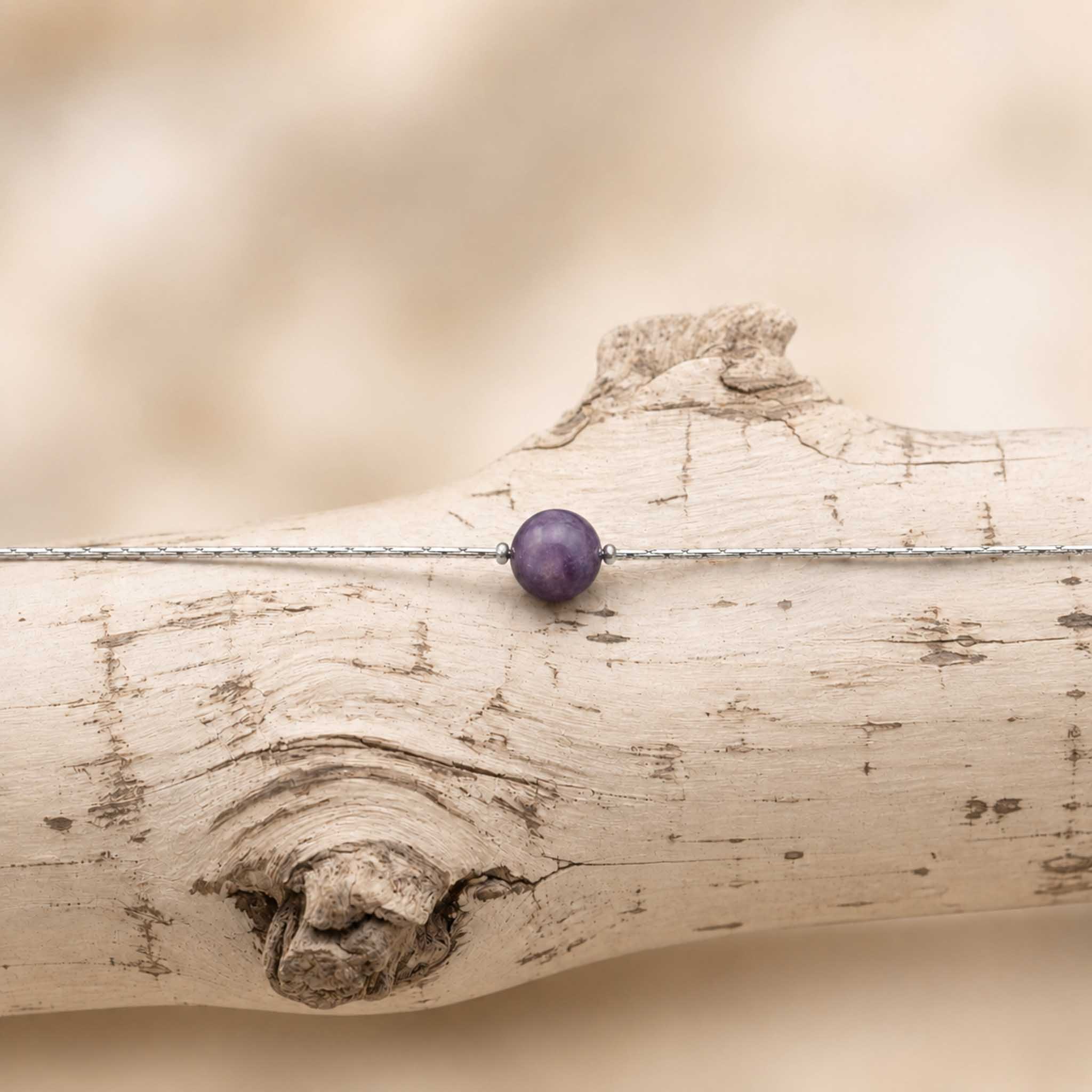 Collana con sfera in pietra naturale