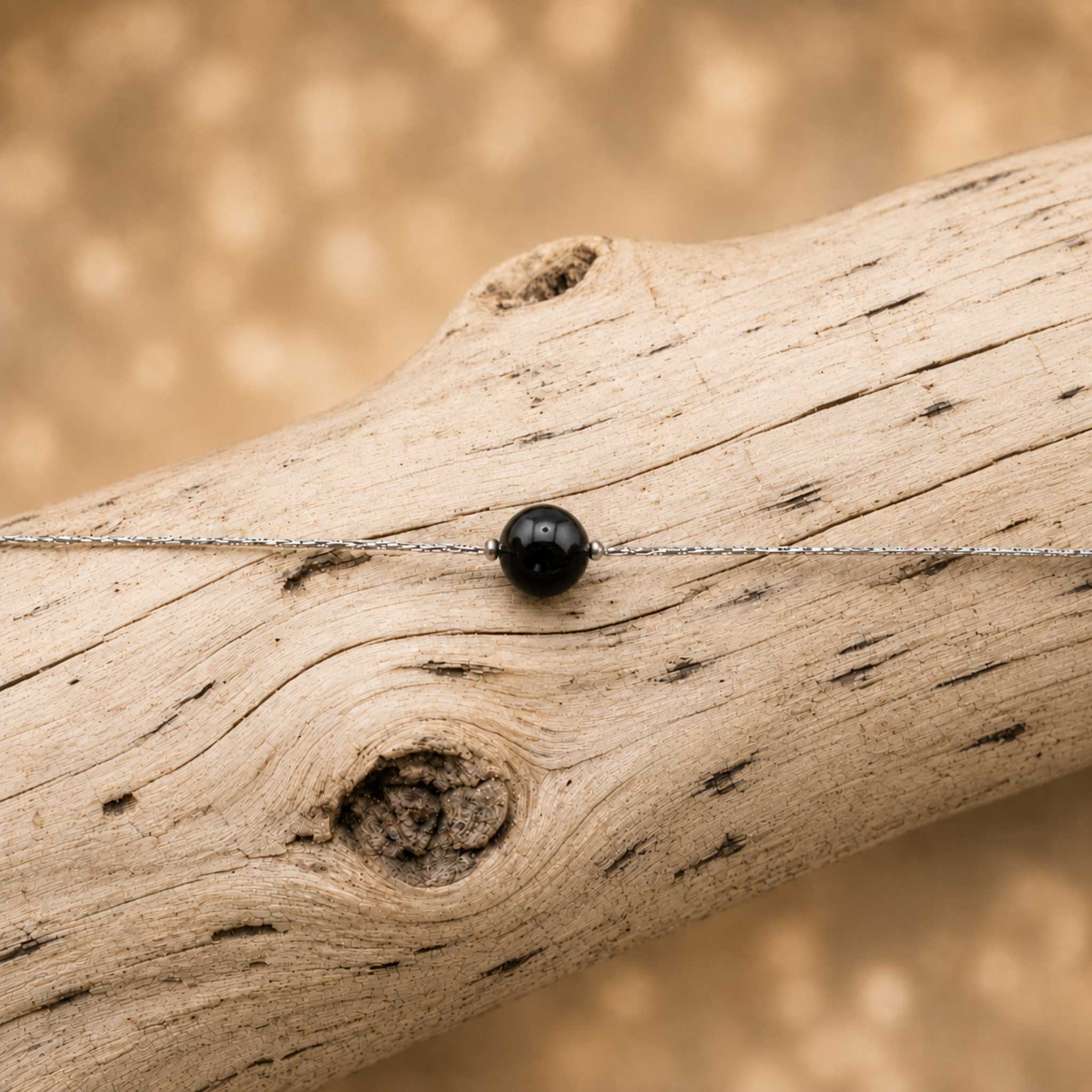 Collana con sfera in pietra naturale